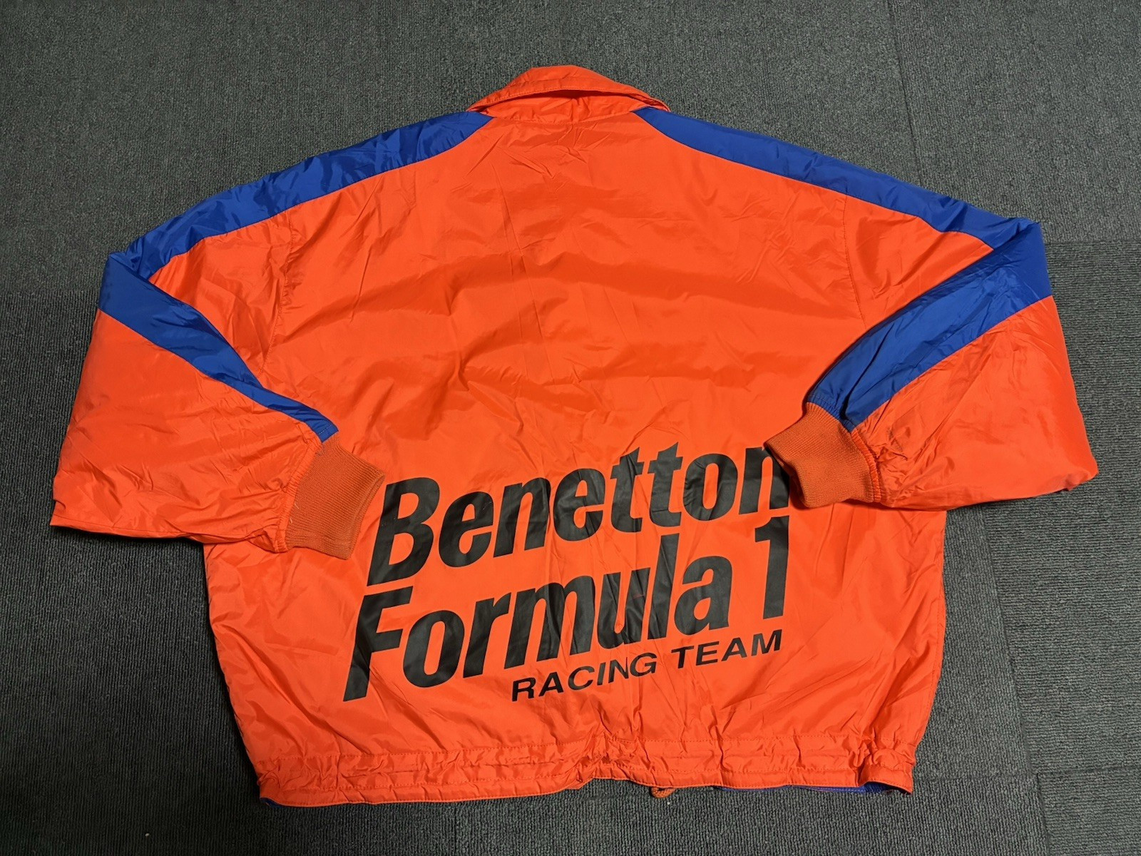 Benetton Formula 1 Racing Team Nylon Jacket Size 48 Japanese XL Orange Blue Vtg