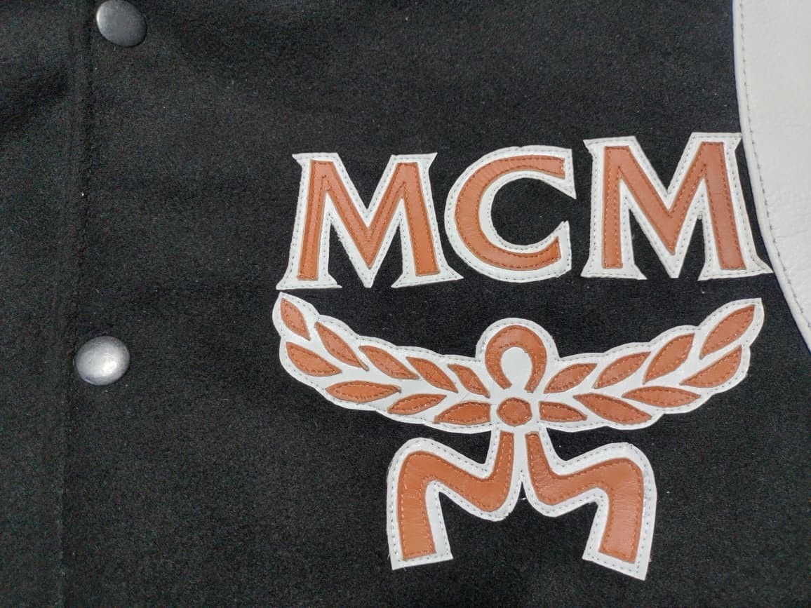 MCM Varsity Bomber Jacket Black Cognac Monogram Sleeves Leather