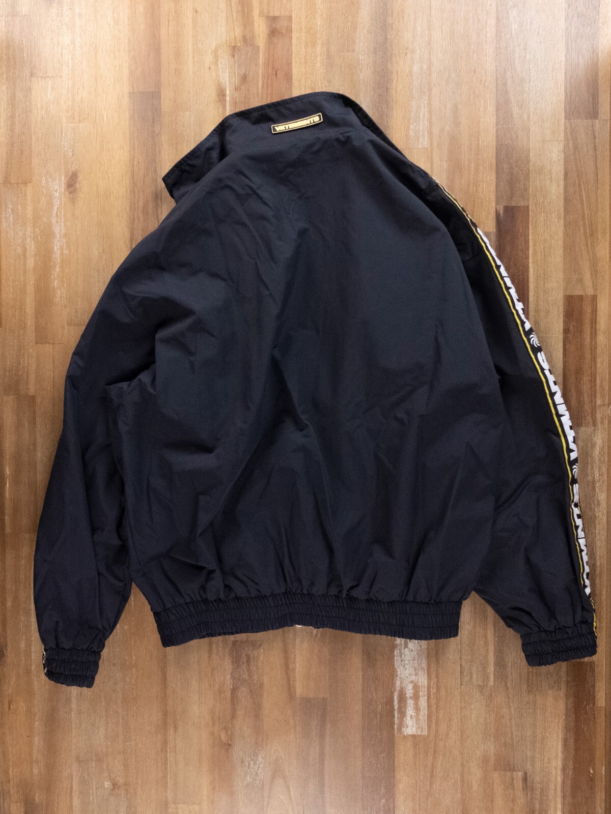 (NO CUSTOMS TAX) VETEMENTS black relaxed fit tape logo panel track jacket Small