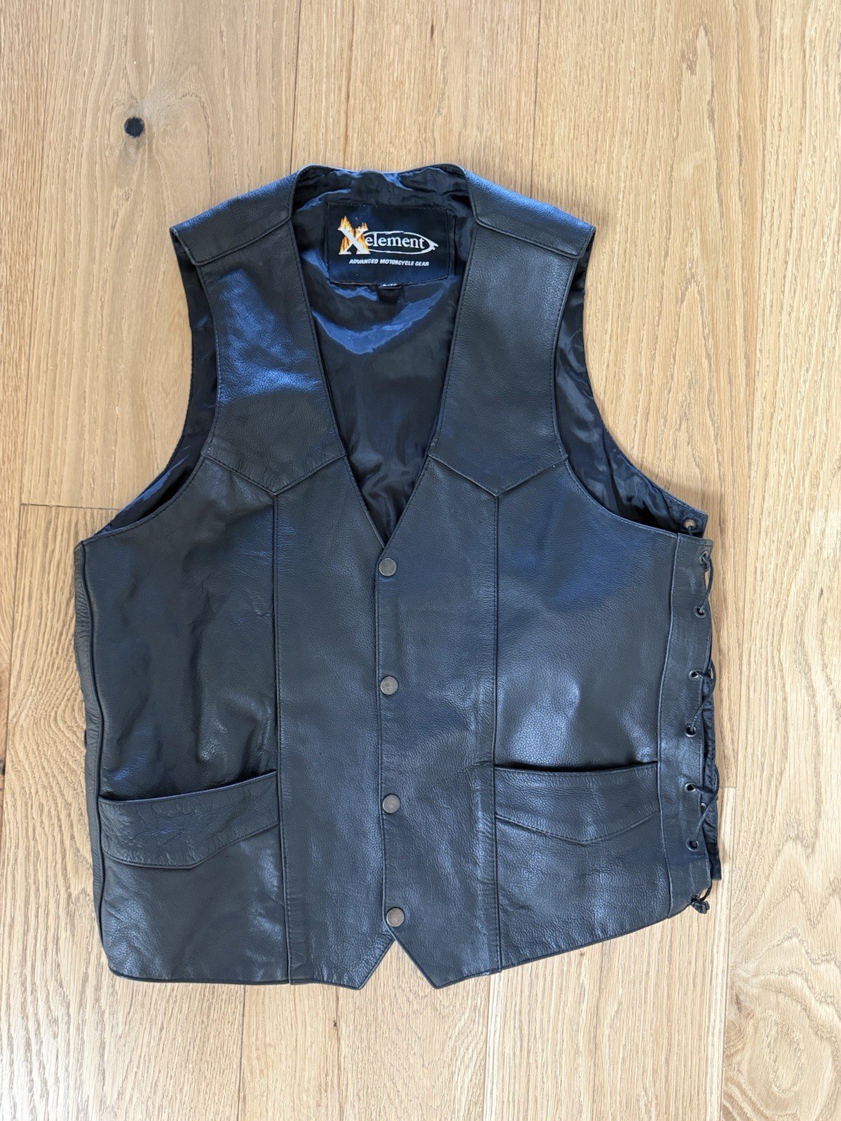 Xelement Men’s L-Tall Black Leather Motorcycle Vest Skull Embroidered Lace-Up