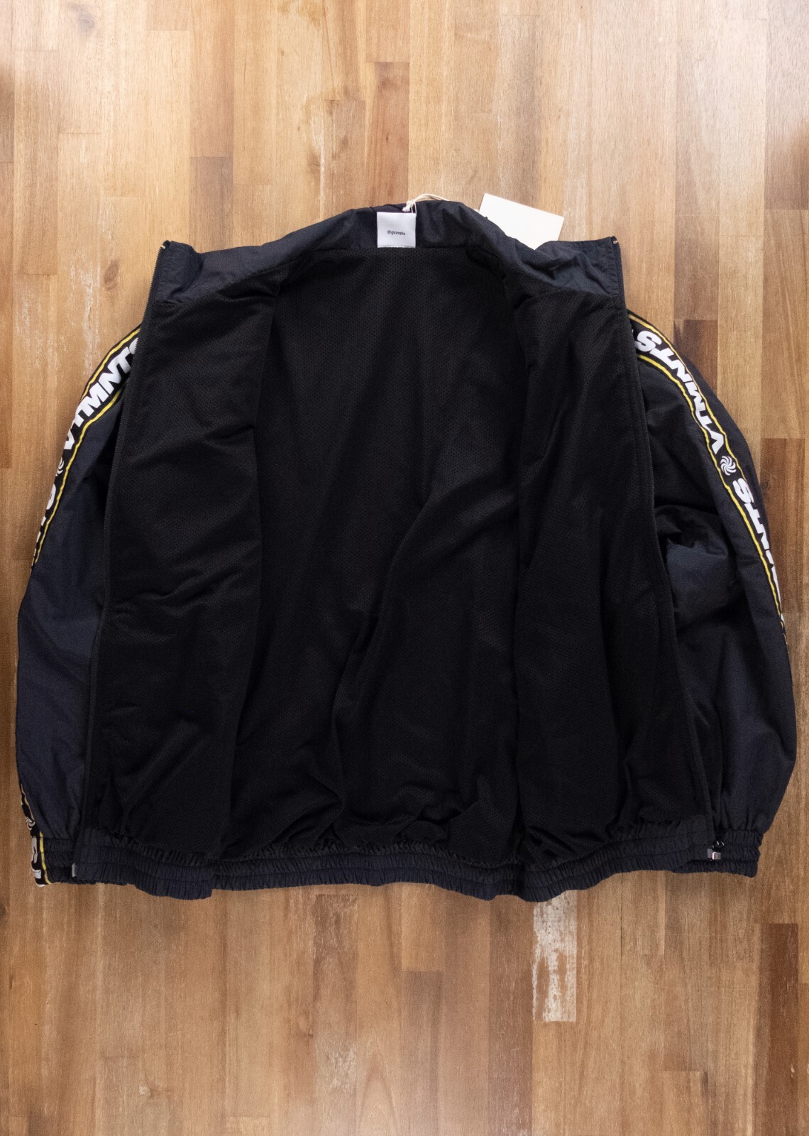 (NO CUSTOMS TAX) VETEMENTS black relaxed fit tape logo panel track jacket Small