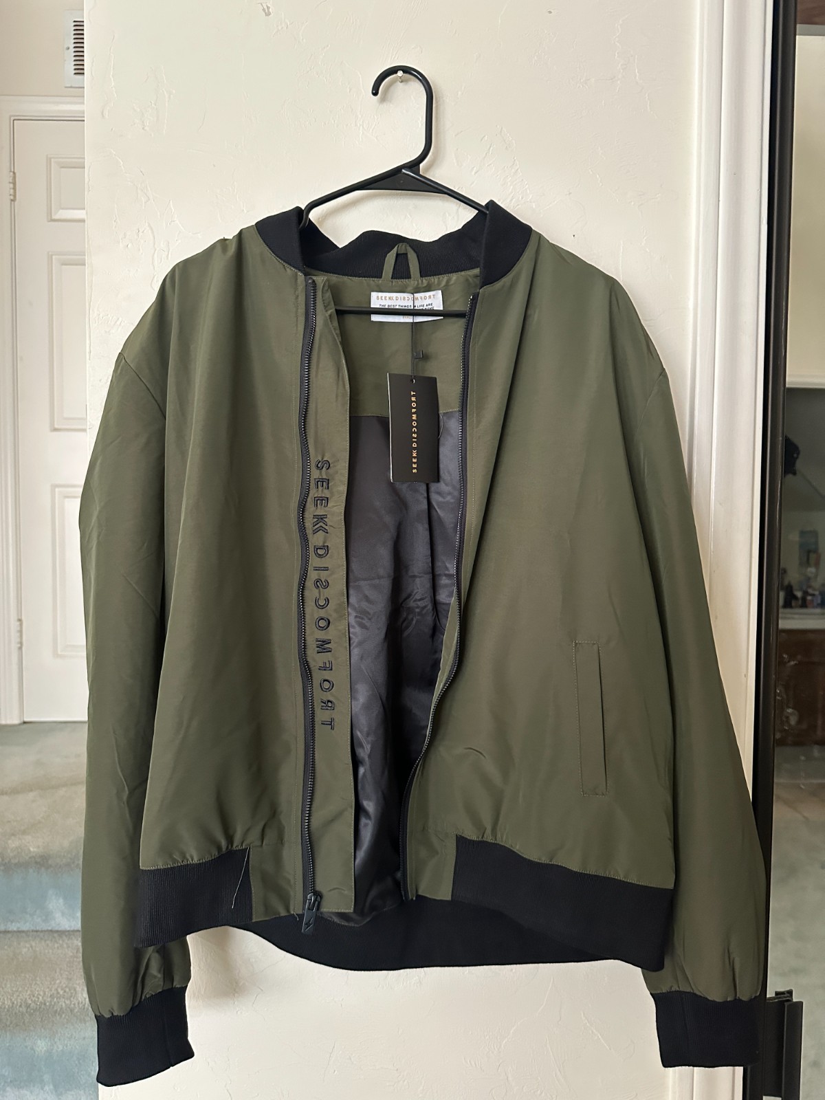 NEW WITH TAGS Green SEEK DISCOMFORT Zippered Jacket by Yes Theory