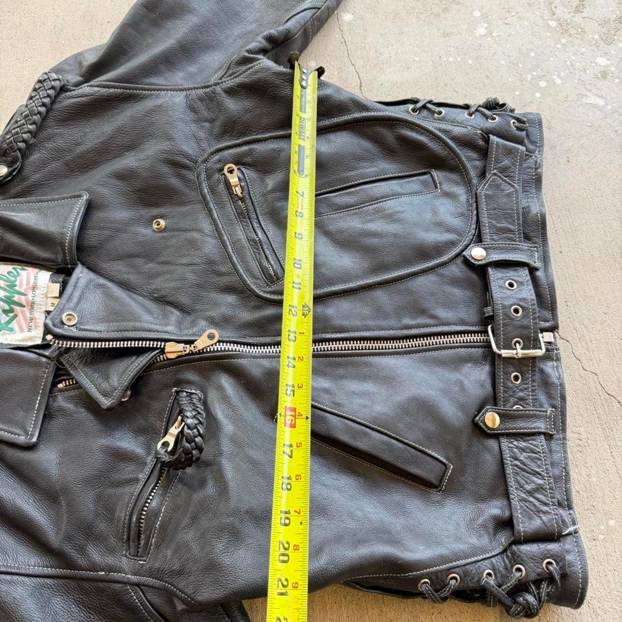 Black leather biker jacket with belt and zipper details Size M
